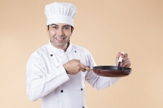 chef with frying pan