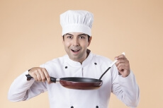 chef with frying pan