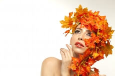 beautiful young woman portraying autumn