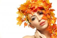 beautiful young woman portraying autumn