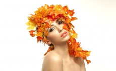 beautiful young woman portraying autumn