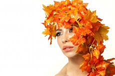 beautiful young woman portraying autumn