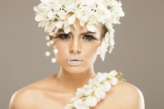 woman covered with white flowers