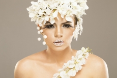 woman covered with white flowers