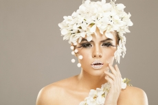 woman covered with white flowers