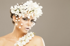 woman covered with white flowers