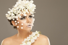 woman covered with white flowers
