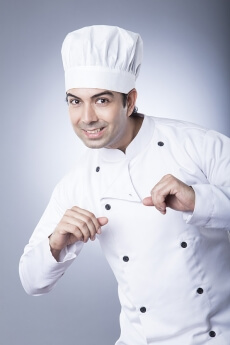 chef smiling and posing 