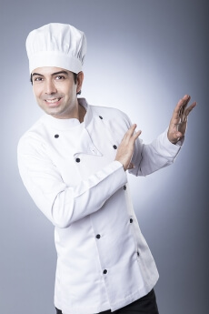 chef smiling and posing 
