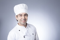 chef smiling and posing 