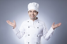 chef smiling and posing 