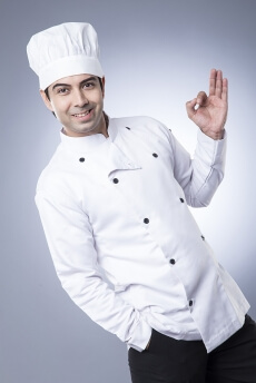 chef smiling and posing 