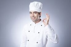 chef smiling and posing 