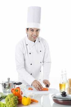 chef chopping carot