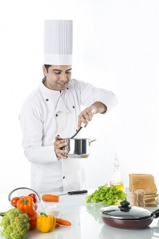 chef cooking in kitchen 