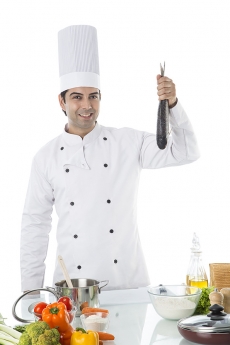 chef cooking fish 