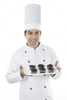 chef with cupcakes