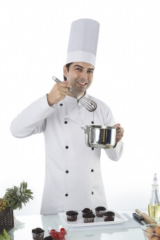 chef with cupcakes