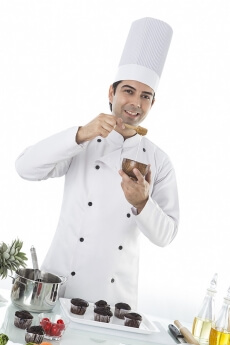 chef with cupcakes
