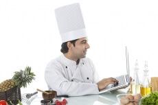 chef working on laptop