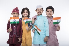 kids from different religions with national flag