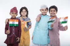 kids from different religions with national flag