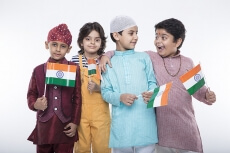 kids from different religions with national flag