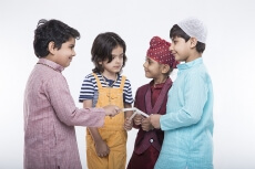 kids from different religion praying with candles