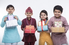 kids from different religions with gifts 