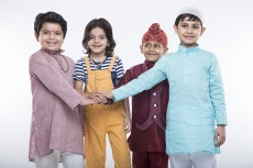 kids from different religions standing together 