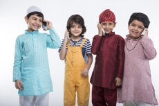 kids from different religions with mobile phones 