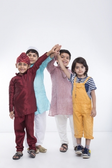 kids from different religions standing together 