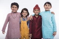 kids from different religions standing together 