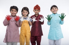 kids from different religion with colourful hands 