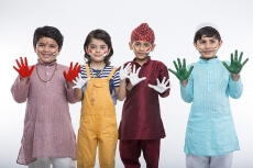 kids from different religion with colourful hands 