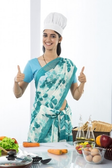 indian housewife showing thumbs up