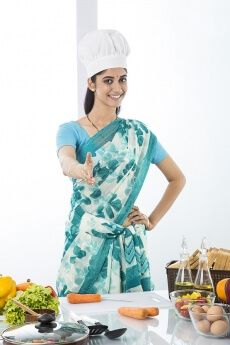 indian housewife posing in shake hand gesture