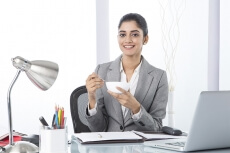 corporate woman talking while working 