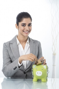 woman in formals with piggy bank 
