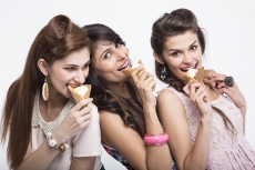 three girls eating ice cream