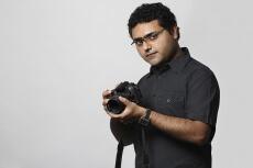 professional photographer with dslr camera