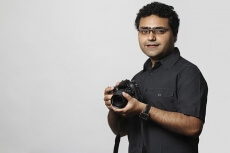 professional photographer with dslr camera