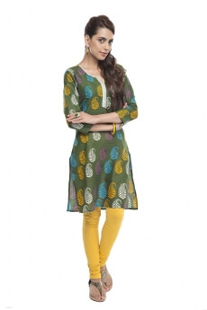 Indian girl in salwar kameez posing with arms crossed