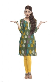 woman in salwar kameez shrugging while posing