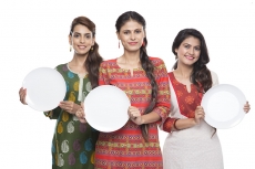 housewife holding with white plate