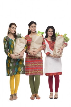 indian woman with vegetables and fruits in shopping bag