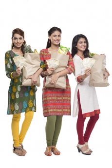 indian woman with vegetables and fruits in shopping bag