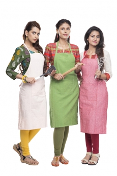women wearing apron with kitchen utensils