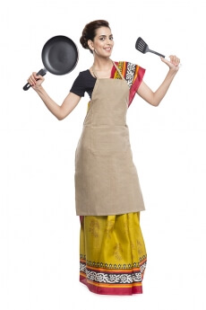 women wearing apron with kitchen utensils