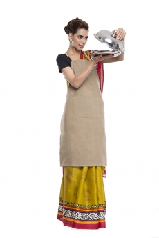 women wearing apron with kitchen utensils